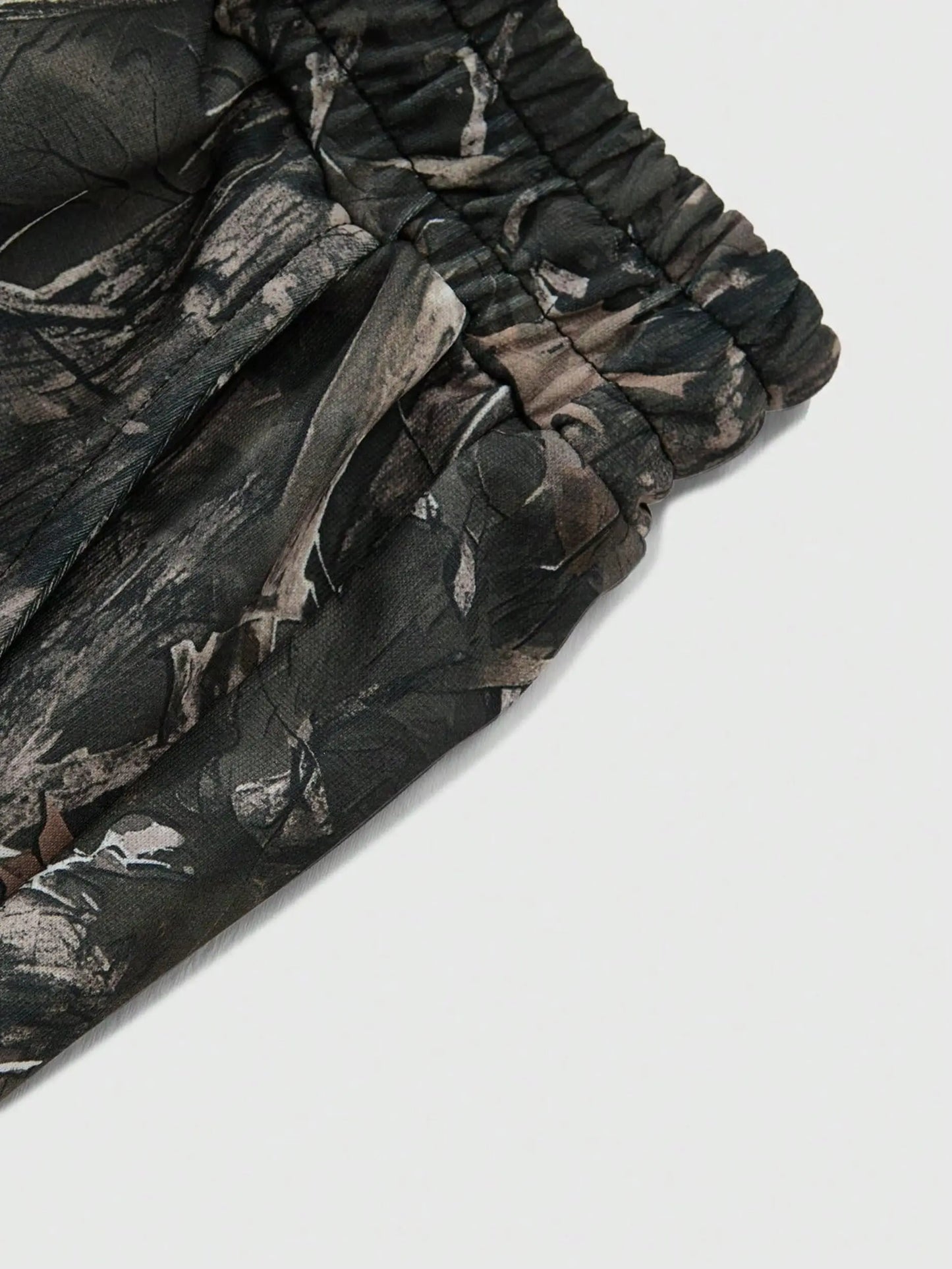 NONECN Men's Camouflage Leaf Patchwork Sweatpants With Pockets