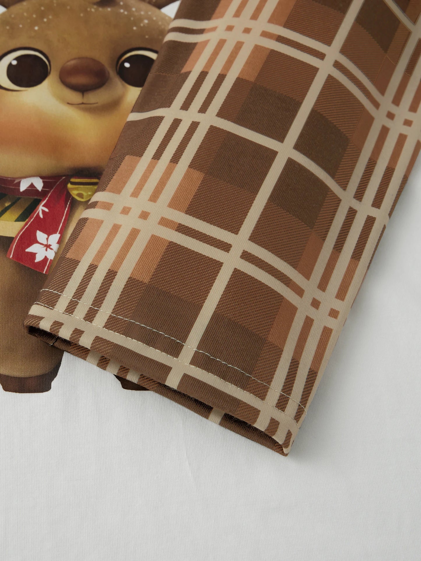 Family Christmas Pajama Set With Festive Plaid And Reindeer Print